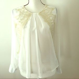 Sheer blouse with lace accents